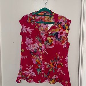 NYC Brand new with tags size L button up top with ruffle sleeves.